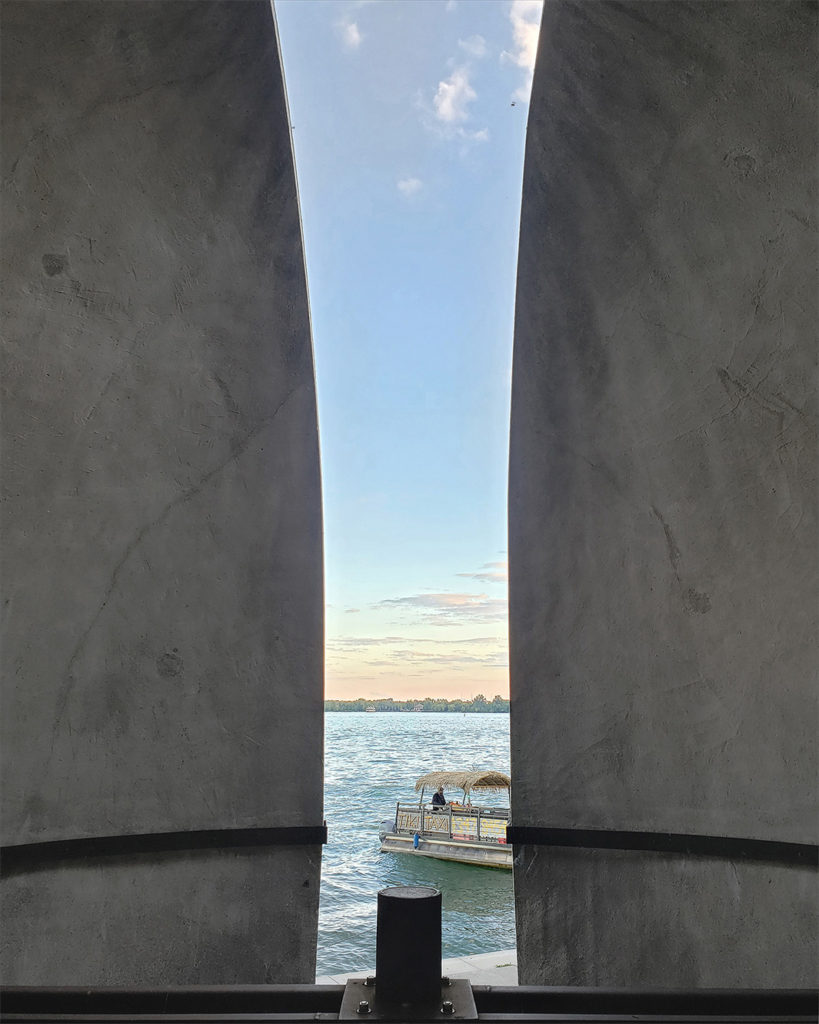 opening of concrete dome onto waterfront